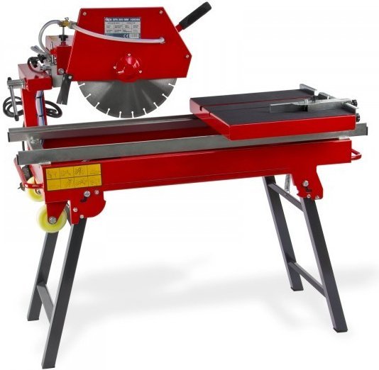 2026/06/1000005233.jpg - pricemagicgh.com Red tile cutter with a circular blade, sliding worktable, and metal stand.