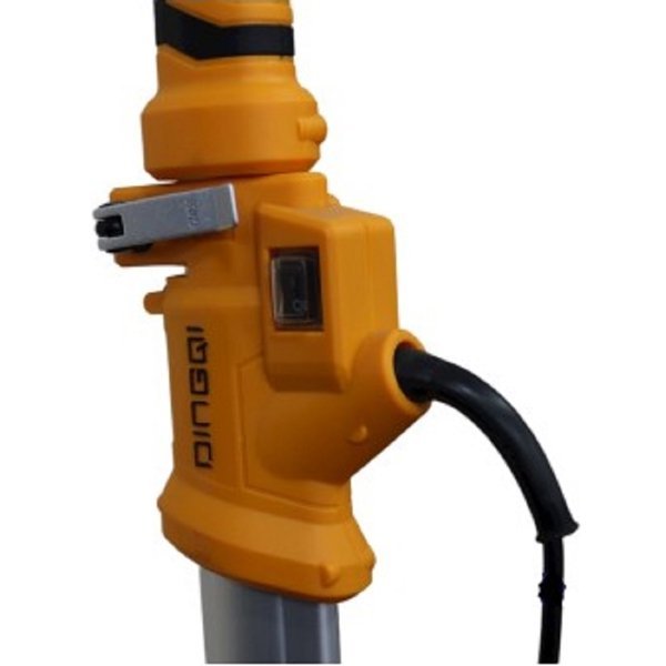 2026/06/1002278317.jpg - pricemagicgh.com Close-up of an orange handheld power tool mounted on a vertical pole, with a black power cord attached and a metal blade/bit protruding to the left.