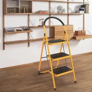 Yellow step ladder on a wooden floor in front of wall shelves filled with books and decor in a minimalist study/office area