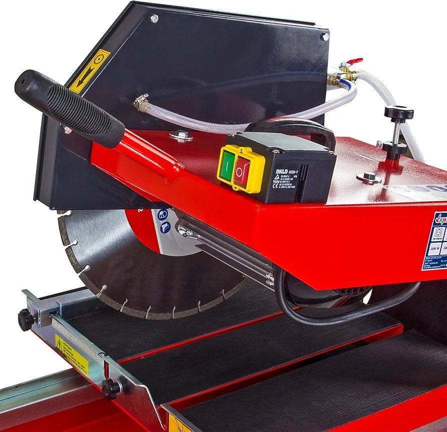 2026/06/1002880732.jpg - pricemagicgh.com Red industrial cutoff saw with a large circular blade, black handle, and safety guard on a metalworking machine.